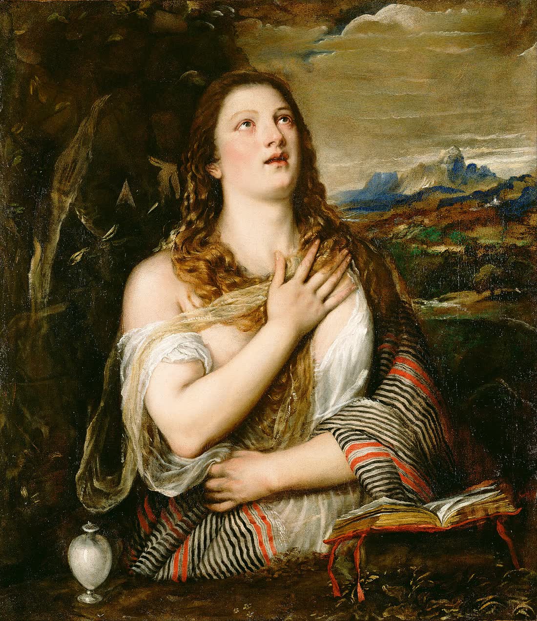 Painting of Mary Magdalene with long loose hair, hands clasped, eyes raised, an alabaster jar beside her.